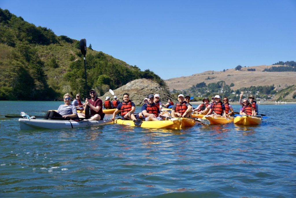 The kayaking group assembles for a photo as they explore the Russian River.