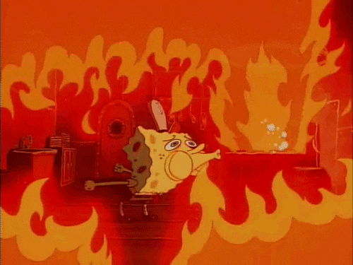 Spongebob trying to blow out a huge fire
