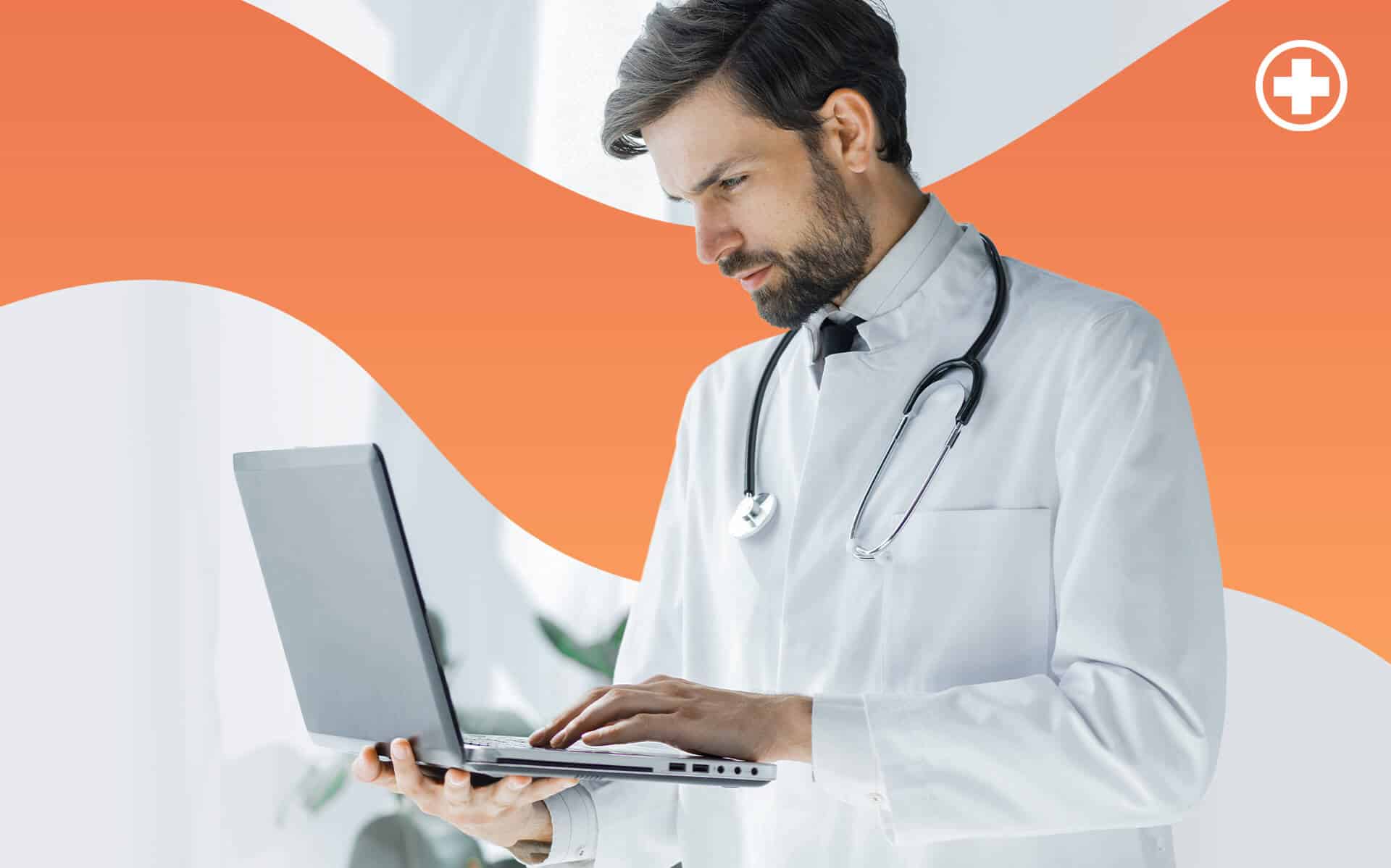 Medic with a laptop in his hands having an orange background.