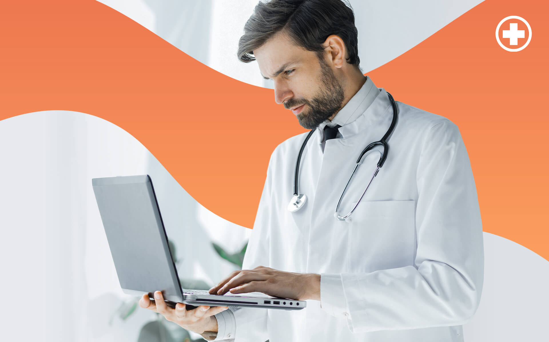 Medic with a laptop in his hands having an orange background.