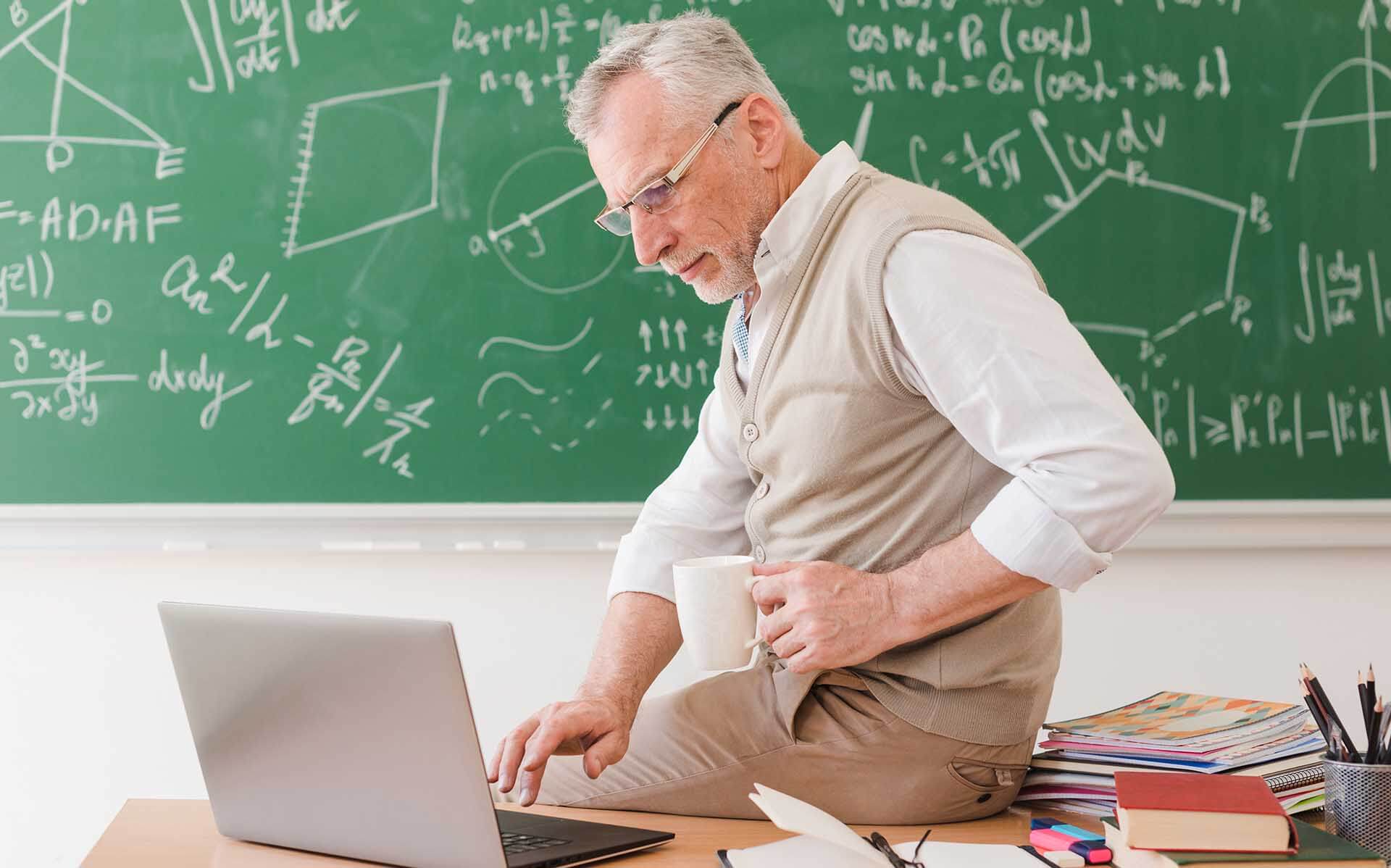 Teacher in front of a laptop